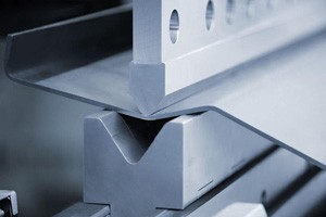 Metal Folding Press Large metal sheeting being folded by press